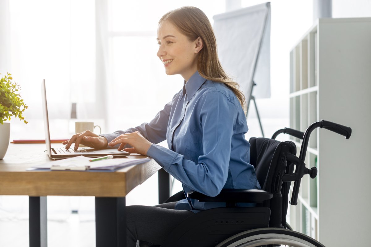 positive-adult-woman-working-office   Freepik.com
